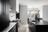 Kitchen, Ceiling Lighting, Range, Undermount Sink, Vinyl Floor, and Porcelain Tile Backsplashe  Photo 2 of 42 in Wright Home by Jamie Tronzo