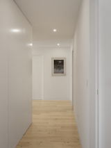 Hallway and Light Hardwood Floor  Photo 14 of 44 in Campolide Apartment by Inês Brandão Arquitectura