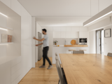 Dining Room, Light Hardwood Floor, and Table  Photo 2 of 44 in Campolide Apartment by Inês Brandão Arquitectura