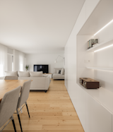 Living Room and Light Hardwood Floor  Photo 10 of 44 in Campolide Apartment by Inês Brandão Arquitectura