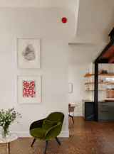 A red doorbell (by Spore Big Ring) near a curve in the living room ceiling evokes a dolphin or elephant profile—not in the original design, but a nice Easter egg for those in the know.