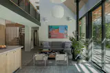 Now, glass sliders that open to the deck measure nine feet tall. The couple opted to keep the main floor’s original tile. In Dina’s view, “it’s really durable—they use it at McDonalds!”