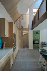 Berg was pleased when his team could draw more attention to the original spiral staircase, which he describes as fabulous. “And I don’t say that often about a spiral staircase,” he says.
