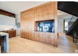 Kitchen, Engineered Quartz Counter, Wood Cabinet, Light Hardwood Floor, and Refrigerator Coffee Bar  Photo 4 of 16 in The Bird House by Erin YEG
