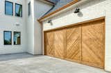 Garage and Attached Garage Room Type Modern Farmhouse with Chevron Garage Doors  Photo 7 of 7 in Cedar Chevron Garage Doors by Doorvana Garage Doors