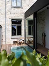 An Extension With a Pool Links a Narrow Belgian Home to Its Backyard - Photo 5 of 11 - 