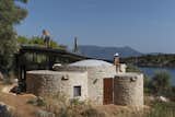 Exterior, House Building Type, Shed RoofLine, Green Roof Material, Stone Siding Material, Metal Roof Material, and Dome RoofLine  Photo 12 of 21 in A Cluster of Earthy, Stone-Built Huts Form a Far-Out Retreat in Greece from Meganisi House