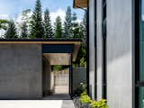 Exterior, Concrete Siding Material, Flat RoofLine, House Building Type, and Metal Roof Material The delicate and monolithic nature of stone and tile was selected to emphasize that this home is a monument to the occupants’ vision for the property.  Photo 16 of 27 in Haiku House by See Arch
