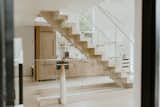 Host Residence by Dawn Kirker staircase and kitchen