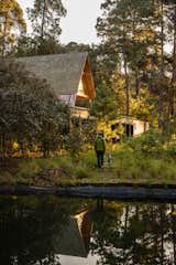 A small water deposit on the property allows the family to collect water during the months with heavy rain and reuse it during the dry season.