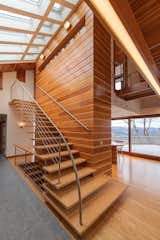 One of the most difficult parts of the project, according to MacLean, the floating staircase in the main house connects the main living area with the upstairs. The stainless steel railings match the ones found on the exterior deck. 