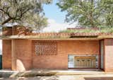 Katz played with different window orientations to create moments of surprise and delight throughout the home. "Brick is an evocative material for many people in Johannesburg," he says, noting that it has the same color as the soil. All brickwork is cavity brickwork, providing further insulation for the home. 