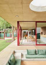 The floor of the conversation pit is custom-treated wood for outdoor use, installed by Silver Fern Timber Construction. 