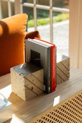 Ben's book, published last year, is tucked amongst other favorite reads on credenza brought over from his last home. 