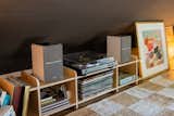 A record player in the loft makes it a popular hangout spot for Ben and his friends. 