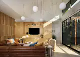 In a tie with the kitchen, the living room is the heart of the home, where the family gathers for a movie night or evening chat. The leather CB2 sofa is the anchor, and the slatted screen to the left adds texture, while allowing more natural light into the hallway. A sculptural pendant adds a playful, contemporary touch. 