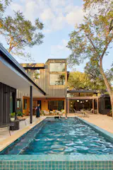 While Bhavani's older son swims as a sport, the entire family—including Lollipop the Pit Bull mix—loves an afternoon in the pool. The architect and her husband chose gravel and hardscape for the backyard, so they didn't have to constantly water a lawn in the Austin heat.  