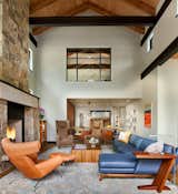 An oversized fireplace clad in Sebastian stone sourced in Arkansas is a focal point in the main living room. 