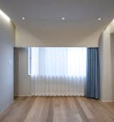 Bedroom, Ceiling Lighting, and Light Hardwood Floor  Photo 3 of 20 in S Apartment 602 by HARUKI OKU DESIGN