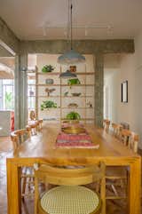 A Renovation Reveals Hardwood Floors and Concrete Beams in This Airy Rio Apartment - Photo 7 of 16 - 