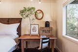 bedroom with antique desk and F&M basket