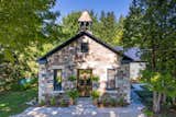 Exterior, Gable RoofLine, Stone Siding Material, House Building Type, and Metal Roof Material Briar Hill Schoolhouse  Photo 1 of 56 in Briar Hill Schoolhouse by Niccols Grocott Design
