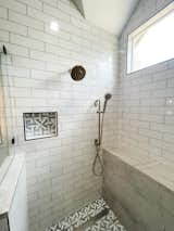 White subway wall tile, geometric shower pan tile, With waterfall quartz ledge