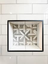 Geometric tile in shower niche 