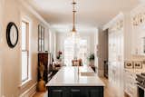 Kitchen, Quartzite Counter, White Cabinet, Undermount Sink, Pendant Lighting, and Light Hardwood Floor 10' island. Wow.  Photo 9 of 18 in Old to Almost New by Pamela Bowles