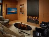 Custom Da Vinci gas fireplace with blackened steel accent wall