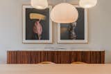 Dining Room, Chair, Table, Ceiling Lighting, and Bar Andrea Torres artwork by the dining room   Photo 9 of 10 in The Reguliersgracht House by Marina Corona