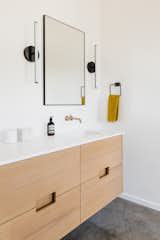 Bath Room, Engineered Quartz Counter, Concrete Floor, Drop In Sink, and Wall Lighting  Photo 11 of 22 in Stafford Residence by Ment Architecture