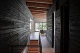 Hallway, Medium Hardwood Floor, and Light Hardwood Floor  Photo 9 of 11 in Swift Cabin by Ment Architecture