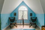Living Room, Bench, Chair, Light Hardwood Floor, and Rug Floor  Photo 15 of 16 in Old Wood Path Beach House by Rebekah Jenkins