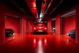 Three-car parking garage with integrated storage room  Photo 9 of 15 in Antares Duplex 22.03 & 23.03 by NYCDesign