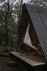 The “Tesla” doors can be hooked to the sides of the cabin; when closed, they have a seamless finish.