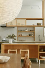 Vista House kitchen with open shelving and mosaic backsplash tiles.