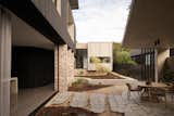 Lachie didn't want to have to maintain a large garden and lawn, so the landscaped garden rooms are perfect.