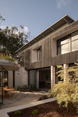 The exterior's charred timber, recycled brick and concrete finishes echo the honest, hardworking materials of Esperance's farm buildings.
