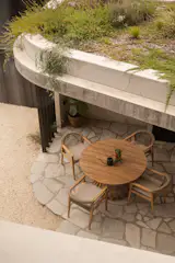 Because the alfresco pavilion is separate to the house, the roof is visible from the upstairs bedroom, so a rooftop garden creates a beautiful view while adding extra interest to the outdoor room with its cascading plants.