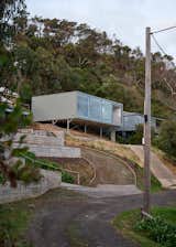 The house is partially off-grid, with all water collected on site and all sewage treated and disposed of on site.