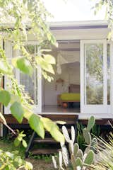 In order to improve the home's flow, Nicole and Tom chose to close in a veranda to create their bedroom. It now overlooks the garden and adjoins a walk-in wardrobe and nursery space.