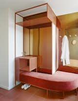 Architect Jane Caught designed this hall stand for the entry way, using coloured steel to echo the copper tones used throughout the house.