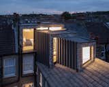 A Brick and Glass Extension Telescopes Out Across the Roof of a London Home - Photo 10 of 10 - 