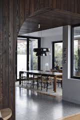 Dining Room, Chair, Storage, Ceiling Lighting, Table, Concrete Floor, and Medium Hardwood Floor  Photo 9 of 36 in The Sorrento House by Jost Architects