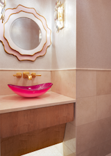 Bath Room, Stone Counter, Vessel Sink, Light Hardwood Floor, Stone Tile Wall, and Wall Lighting Hall Bath  Photo 5 of 6 in Passion in Pink by Leslie Nelson