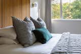 Wood slab headboard and forest views of our 3rd bedroom