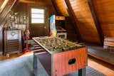 Game loft with foosball and Ms. PacMan (and books and board games)