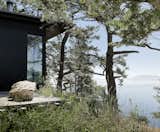 Exterior, Metal Roof Material, Concrete Siding Material, Flat RoofLine, Wood Siding Material, House Building Type, and Glass Siding Material  Andrew Van Egmond’s Saves from Saturna Dwelling