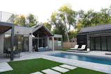 Outdoor, Back Yard, Large Pools, Tubs, Shower, Pavers Patio, Porch, Deck, Grass, and Walkways Modern backyard for Boulder, CO family   Photo 10 of 13 in Modern Boulder Backyard with Pool House by Yardzen